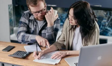couple calculating all their bills