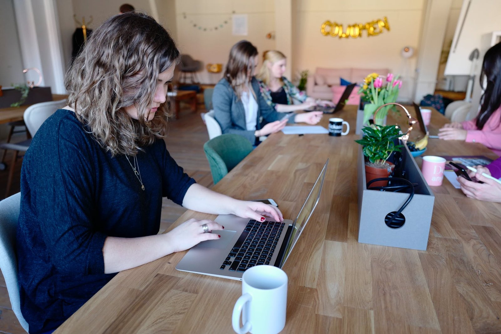 woman using laptop photography
