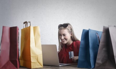 happy woman shopping online at home