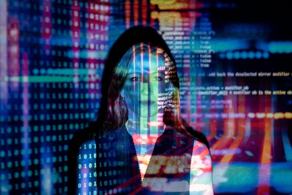 Code projected over woman
