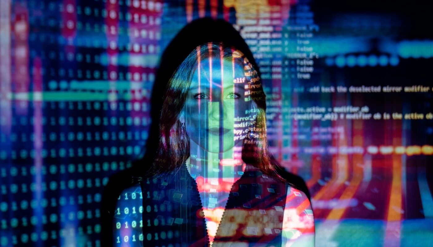 Code projected over woman